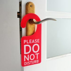 White Plastic Do Not Disturb Door Hanger